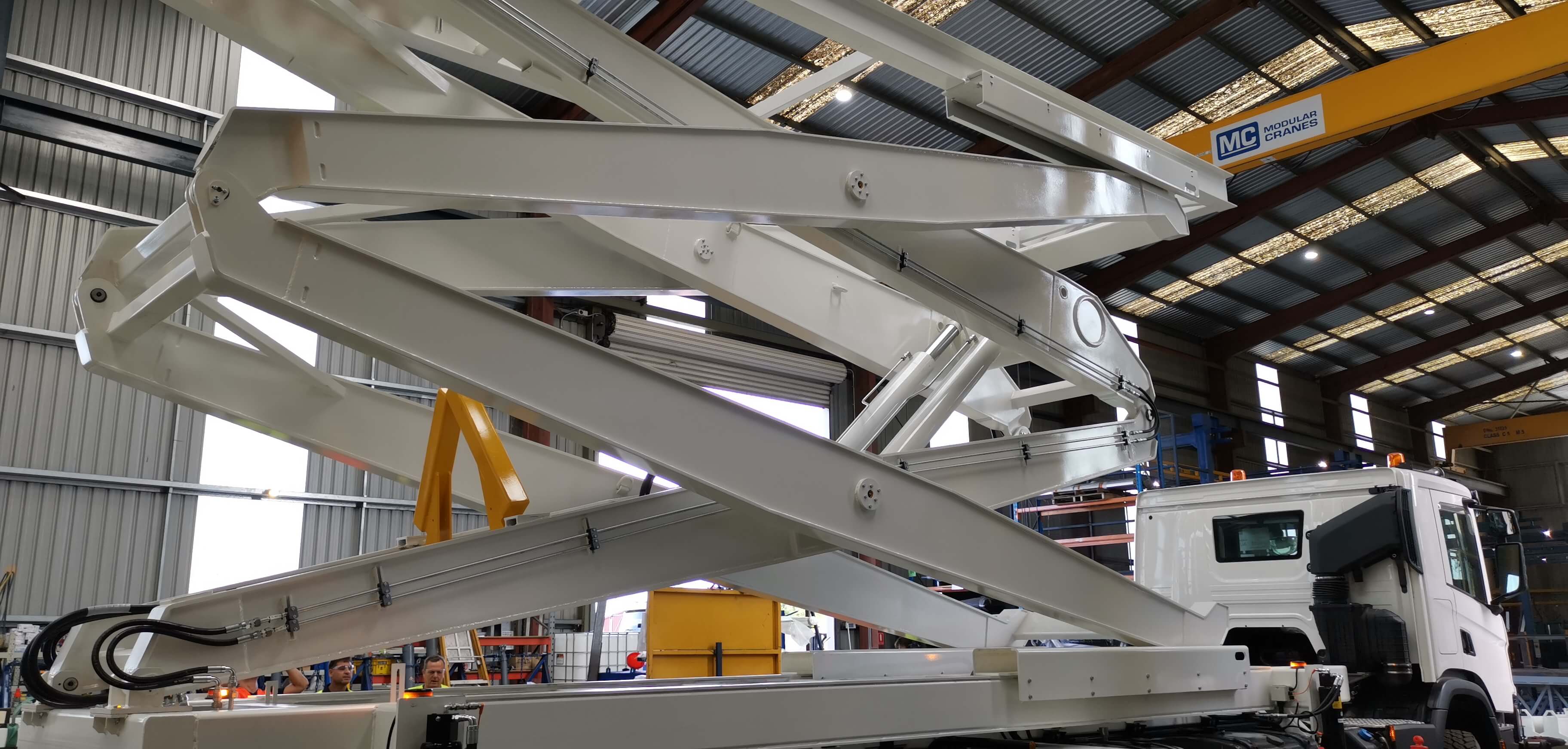 Mobile scissor platform being raised